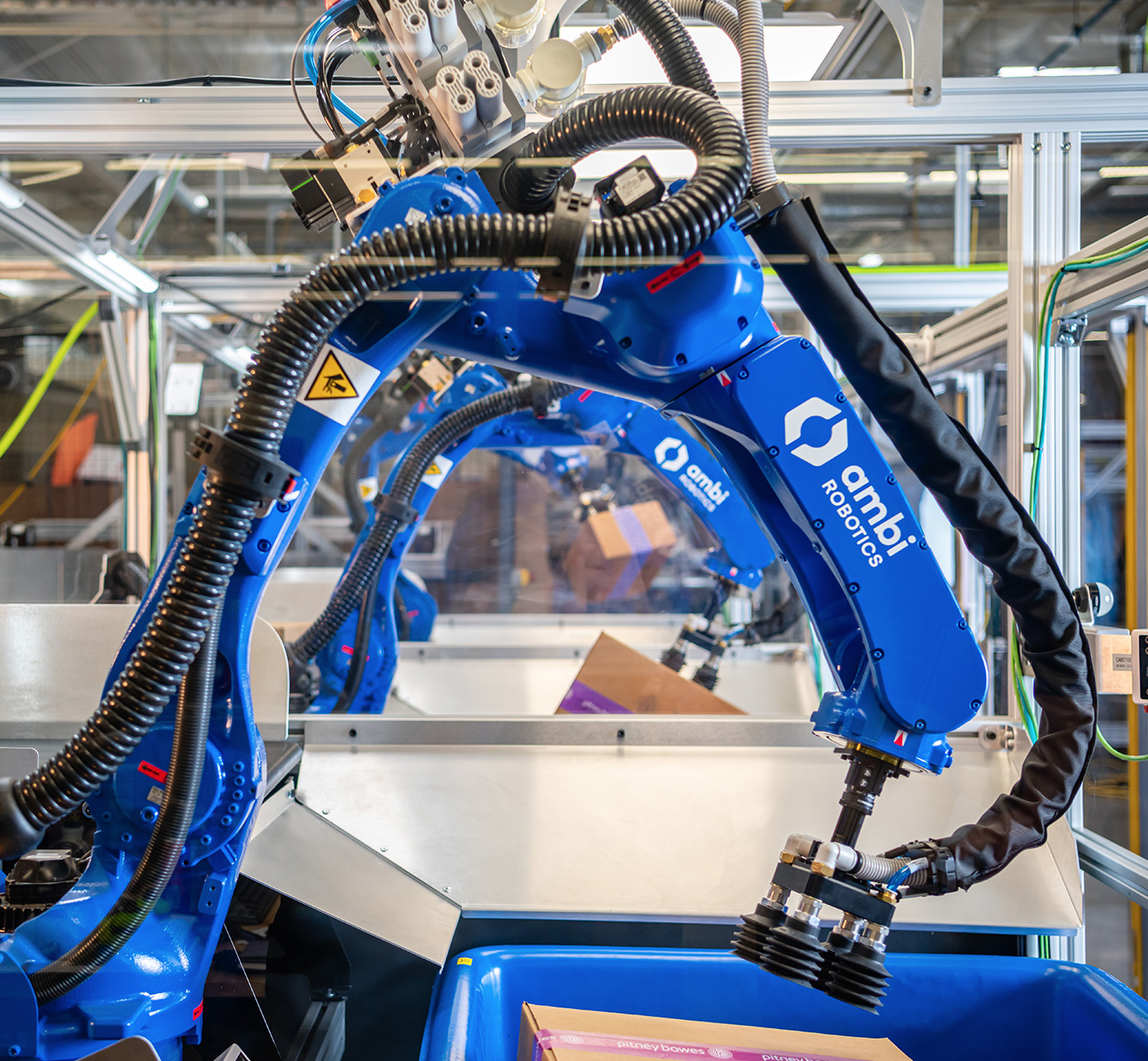 Ambi Robotics bin picking system handling parcels