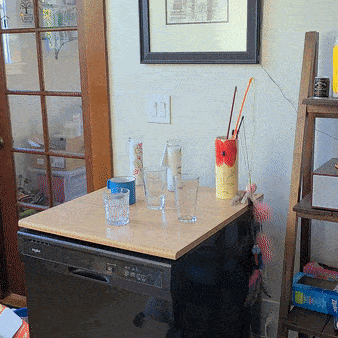 TRI robot placing objects onto a table