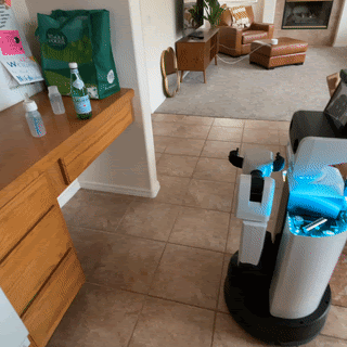 Robotic gripper manipulating items at TRI